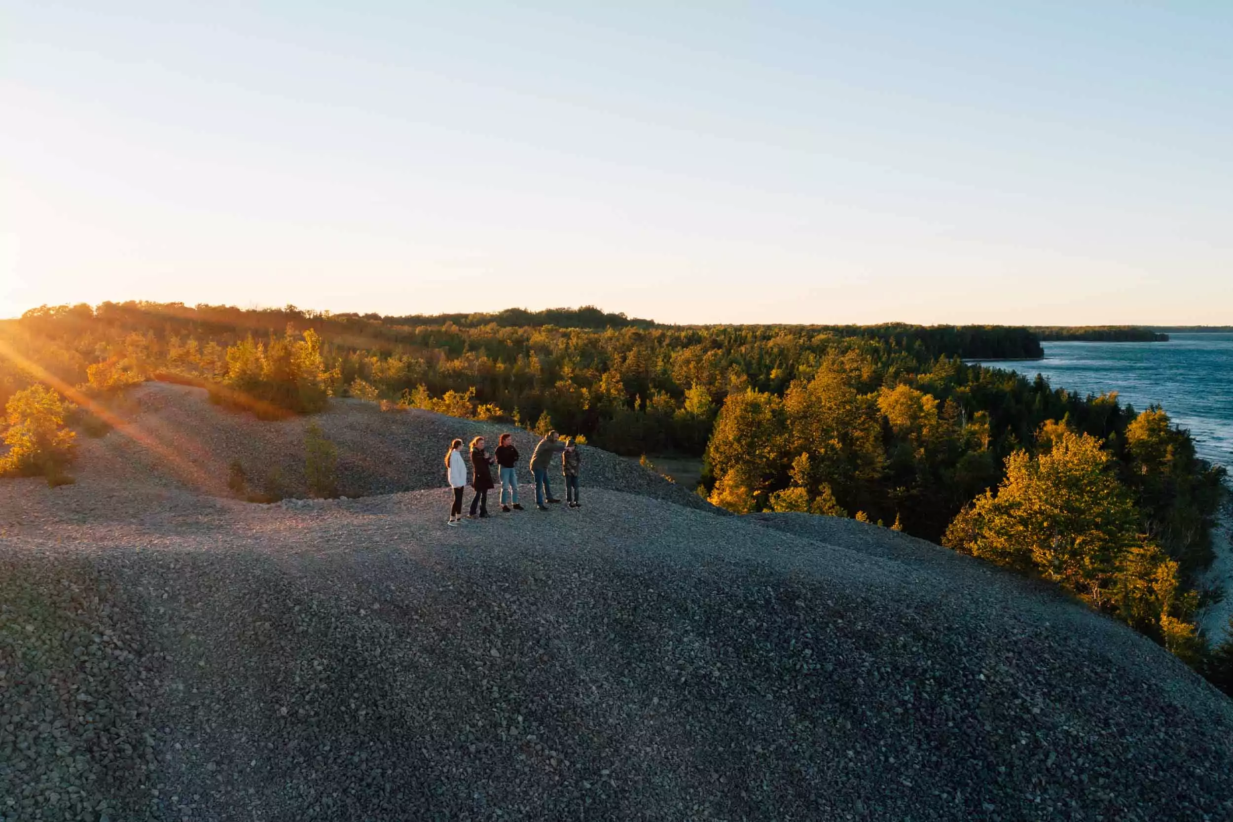 Family enjoys setting sun in Alpena.