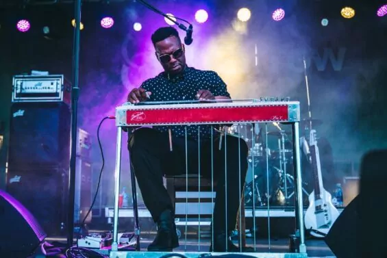 Performer plays the keyboard at the Common Ground Music Festival in Lansing, Michigan.
