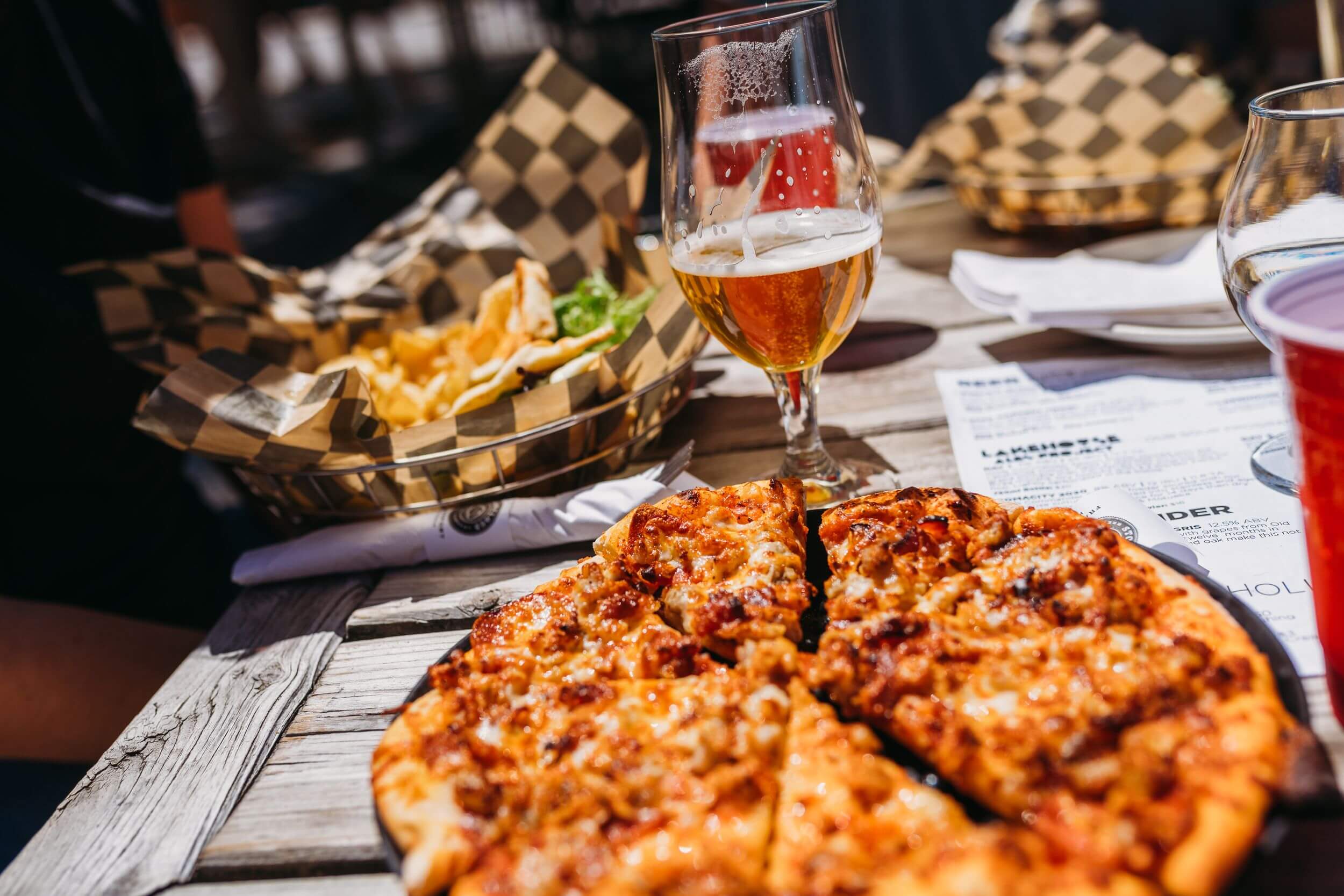 Stormcloud Brewery pizza, beer and fries.