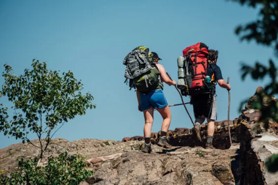 Two hikers atop Lake of the Clouds in Michigan's Upper Peninsula