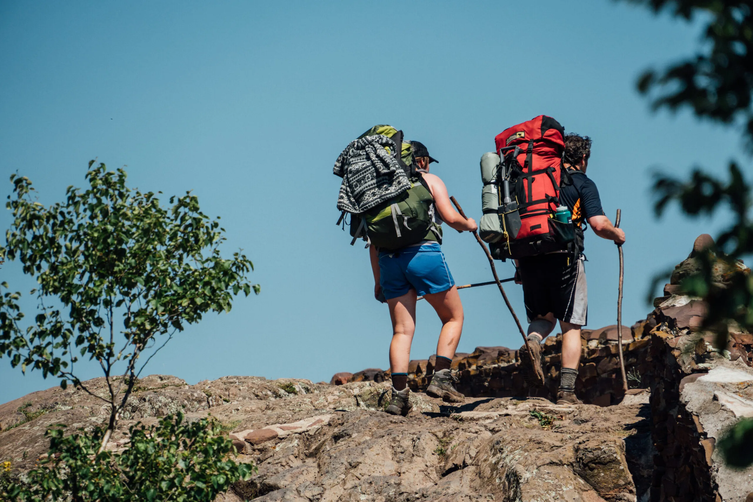 Two hikers atop Lake of the Clouds in Michigan's Upper Peninsula