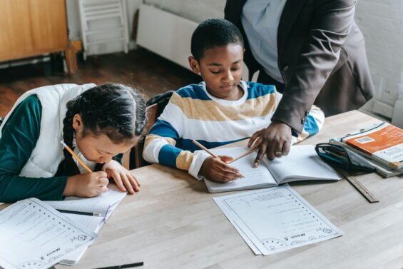 Two students work on their homework.